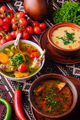 Traditional homemade soup served in earthenware bowls