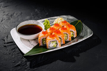 Exquisite sushi roll platter with salmon roe