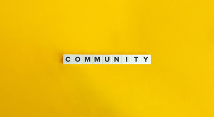 Community Word. Text on Letter Tiles on Yellow Background. Minimalist Aesthetics.