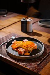 Gourmet seared salmon dish on elegant table setting