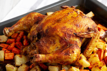 Homemade Hearty Roasted Chicken on Tray, side view. - 788247804