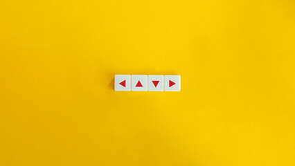 Concept of Dilemma, Direction, Decision Making, Insecurity, Indecisiveness. Red Arrows on Block Letter Tiles against Yellow Background. - obrazy, fototapety, plakaty