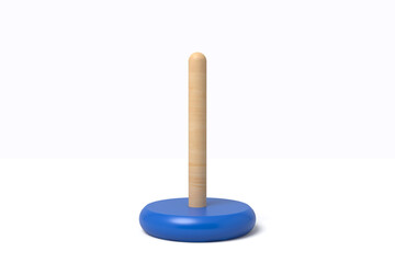 Blue toy ring at the base of a wooden stacking pole