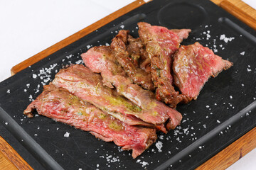 Skirts steak top view. Close up photo with a delicious beef diaphragm steak medium rare cooked on...