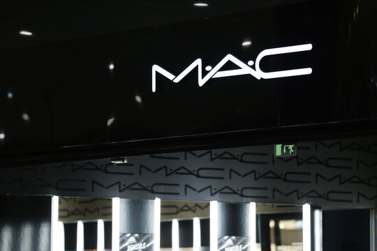 Bucharest, Romania - 15 April 2024: The logo sign of MAC company on top of a cosmetics store. MAC is a Canadian cosmetics manufacturer founded in Toronto.