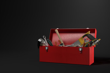 Open toolbox with tools in shadow on dark