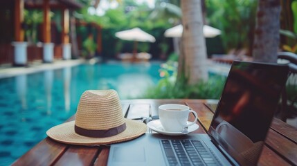 Laptop mockup with coffee cup by the poolside. Remote work with leisurely poolside break.
