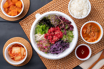 Korean food, Korean beef, beef sashimi,  beef sashimi, raw pork belly, charcoal fire, seasoning, ribs, side dishes, galbitang, rice, kimchi, ssamjang, chili peppers, garlic, radish sprouts, lettuce