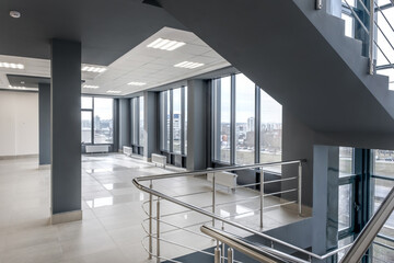 panorama view in empty modern hall with columns, doors, stairs and panoramic windows - 788298495