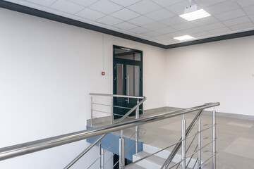 panorama view in empty modern hall with columns, doors, stairs and panoramic windows - 788298662