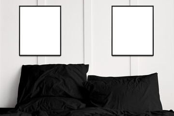 Blank picture frames on a white bedroom wall