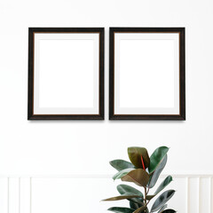 Picture frame mockups hanging on a white wall