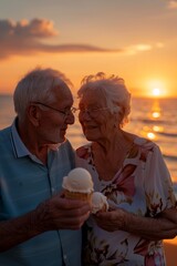 Senior couple sharing ice cream at sunset on beach