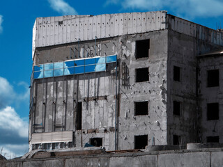 Modern abandoned building. Abandoned concrete building. Contemporary architecture. Unfinished. Building fragment. Grunge background. Ust-Kamenogorsk (kazakhstan)