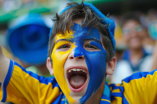 Young soccer supporter with face paint screaming in stands