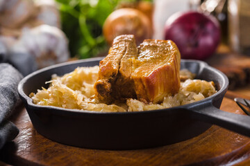 Traditional spare ribs baked in sauerkraut.