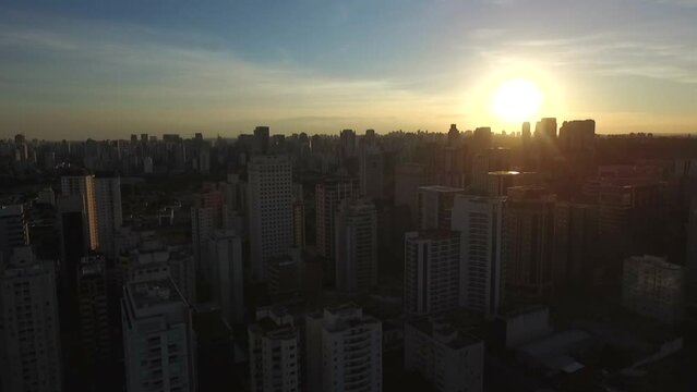 Aerial view of SAO PAULO city, sunset city, drone shot, 
This image is perfect for projects related to events, travel and tourism.