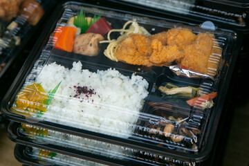 Bento is a ready-to-go portion of food, quite common in Japanese cuisine. Traditionally it usually includes rice, fish or meat, and a vegetable-based garnish or accompaniment.