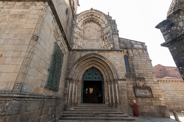 Guimaraes, Portugal. Details of the facade of the Collegiate Church of Nossa Senhora da Oliveira - obrazy, fototapety, plakaty