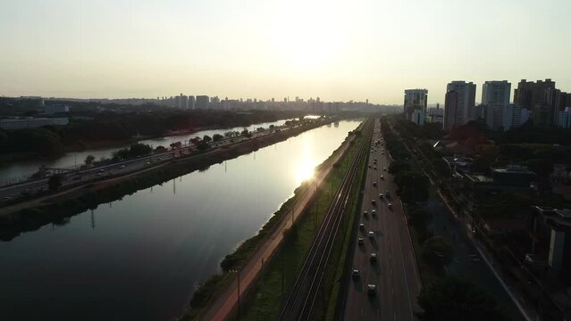 Aerial view of Marginal Pinheiros in S&atilde;o Paulo city, Sunset drone shot, This image is perfect for projects related to events, travel, journalism, real estate