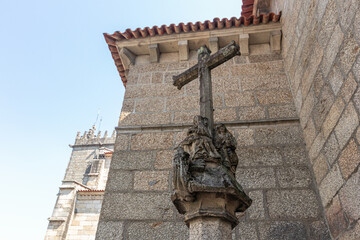 Guimaraes, Portugal. Details of the facade of the Collegiate Church of Nossa Senhora da Oliveira - obrazy, fototapety, plakaty