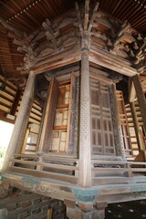 Obraz premium Buddhist Hase-kannon Hasedera temple complex Kyozo with buddhist scriptures showing the prayer. in Kamakura, Japan in March