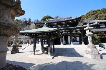 Buddhist Hase-kannon temple upper main square with main temple in Kamakura, Japan in March