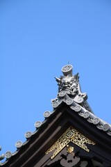 Fototapeta premium Deamon mask on roof in Kamakura, Japan in March