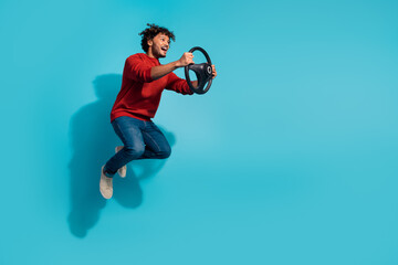 Full body size photo of taxi driver latin man jumping in traffic hold steering wheel control automobile isolated on cyan color background - obrazy, fototapety, plakaty