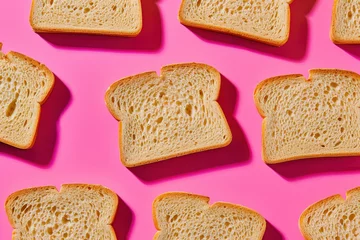  Slices of white bread arrangement on vibrant pink background, flat lay composition, top view perspective © SHOTPRIME STUDIO