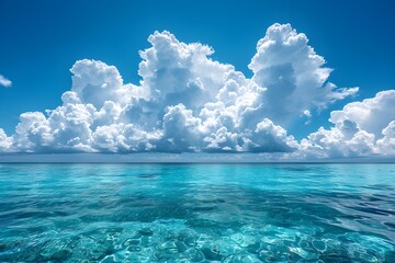Beautiful cloudscape over the wide, mirror-clear sea on a clear day - obrazy, fototapety, plakaty