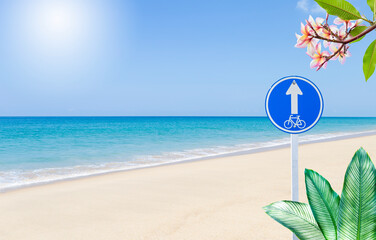 Bicycle sign on tropical beach, summer outdoor day light