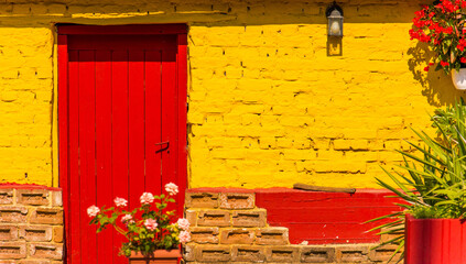 Architecture Image Door on Yellow Building. Greek facade in an old traditional greek house....