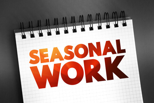 Seasonal Work text on notepad, concept background