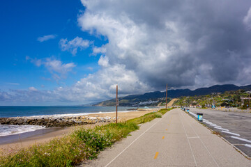 Biking North towards Will Rogers State Beach on the Marvin Braude Bike Path in Los Angeles on a...