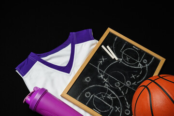 Basketball Strategy Planning With Chalkboard, Ball, and Jersey on Dark Background