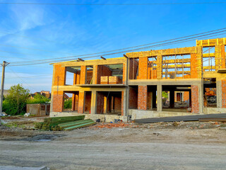 Typical ranch style condo house is brick during under construction