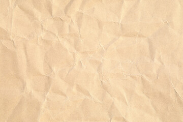 Brown crumpled paper texture closeup