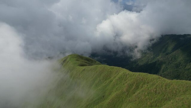 clouds over the anak dara mountains