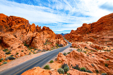 Valley of Fire State Park is a public recreation and nature preservation area south of Overton, Nevada (USA)  in the Mojave Desert, near Las Vegas. Scenic road in colorful red sandstone scenery.