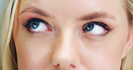 Closeup of eyes, makeup and woman is thinking for beauty, cosmetics and lashes with mascara. Skin,...