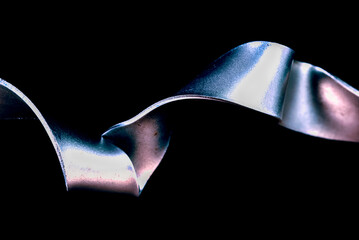 Abstract metal steel curve on isolated black background