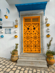 Aged and colorful Andalusian-style doors, with their classic Arabic ornaments, they decorate the...