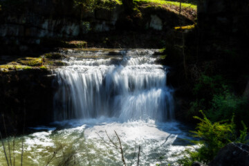 Obraz premium Hideden small waterfall in the mountains