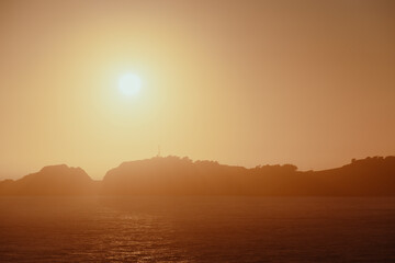 Beautiful sunset in the Bay of San Francisco near the Golden Gate Bridge, California, USA