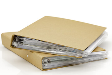 Cardboard folders for document storage.