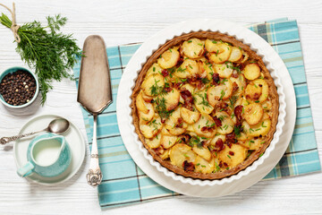 Irish potato pie with bacon in baking dish