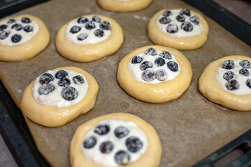 Homemade buns. Bbuns with berries and cottage cheese