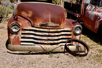 old rusty truck in the junkyard