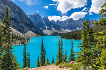 Fototapeta na wymiar Alpine lake in mountains. Moraine Lake in Banff National Park, Canadian Rockies, Alberta, Canada.